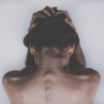 woman sad depression skin headache 2609115